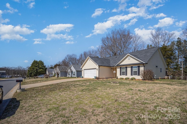 ranch-style house featuring a garage, concrete driveway, and a front lawn