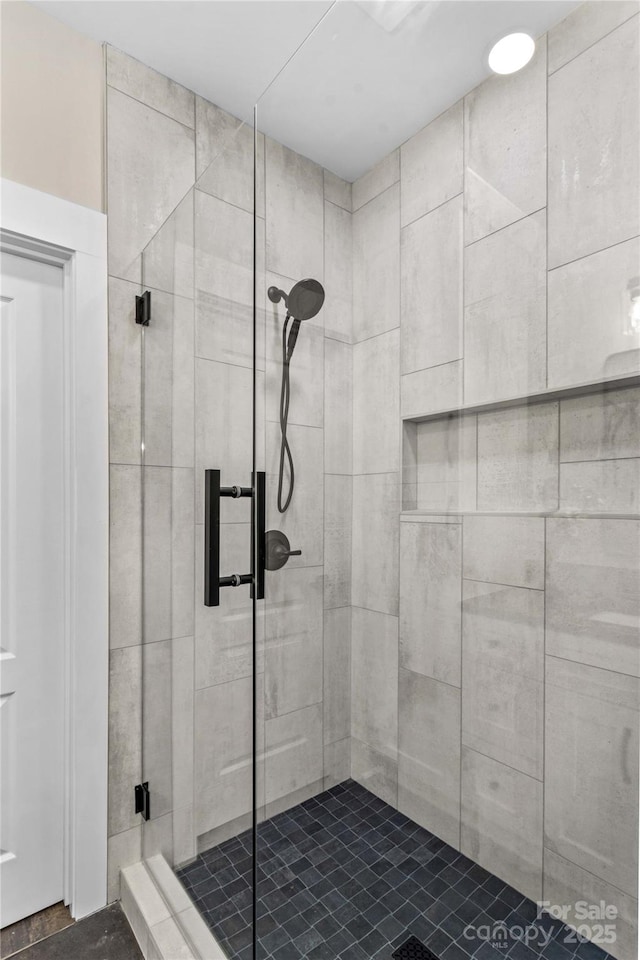 full bathroom with a shower stall