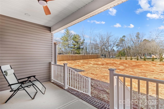 view of patio / terrace featuring ceiling fan