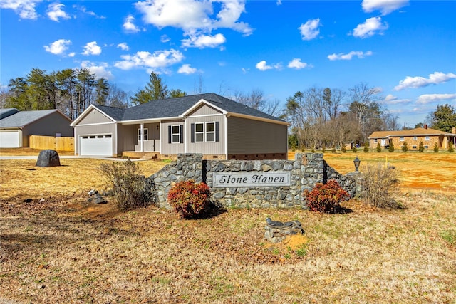 view of front of property with a garage and crawl space