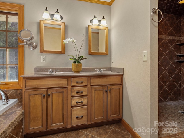bathroom featuring a sink, a relaxing tiled tub, tiled shower, and double vanity