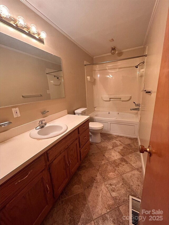 bathroom featuring visible vents, toilet, ornamental molding, vanity, and  shower combination