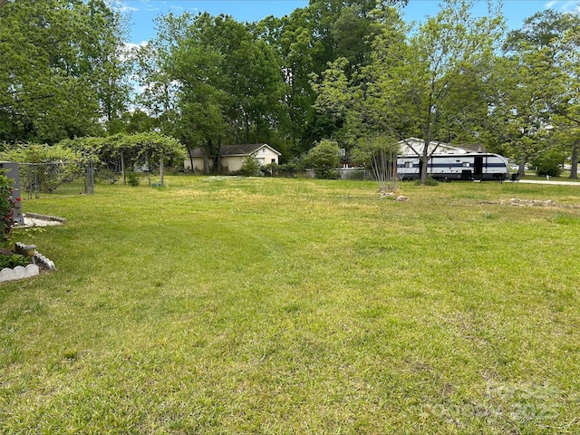view of yard with fence
