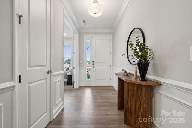 1439 Hubert Graham Way, Tega Cay, SC 29708 - entrance foyer with crown molding and dark wood-style flooring