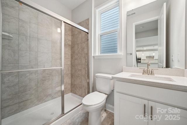 1439 Hubert Graham Way, Tega Cay, SC 29708 - full bathroom featuring a stall shower, toilet, and vanity
