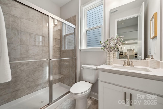 1439 Hubert Graham Way, Tega Cay, SC 29708 - bathroom with a shower stall, toilet, and vanity