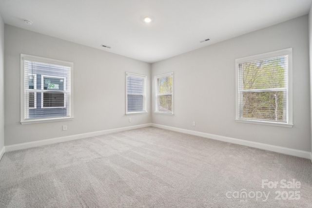 1439 Hubert Graham Way, Tega Cay, SC 29708 - unfurnished room with plenty of natural light, baseboards, and carpet flooring