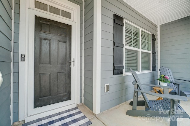 entrance to property with a porch