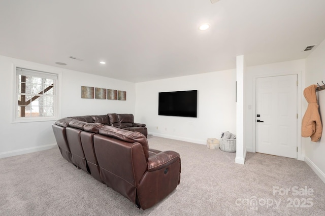 living room with carpet flooring, recessed lighting, baseboards, and visible vents