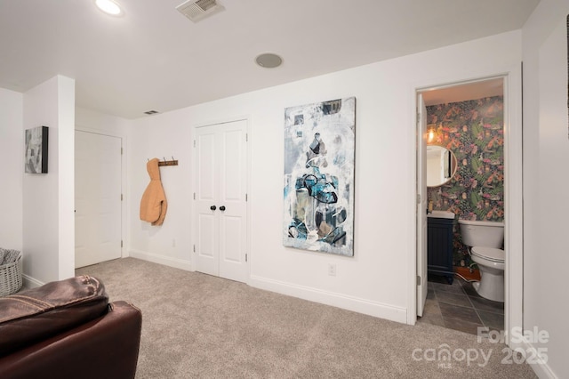 sitting room with visible vents, recessed lighting, baseboards, and carpet floors