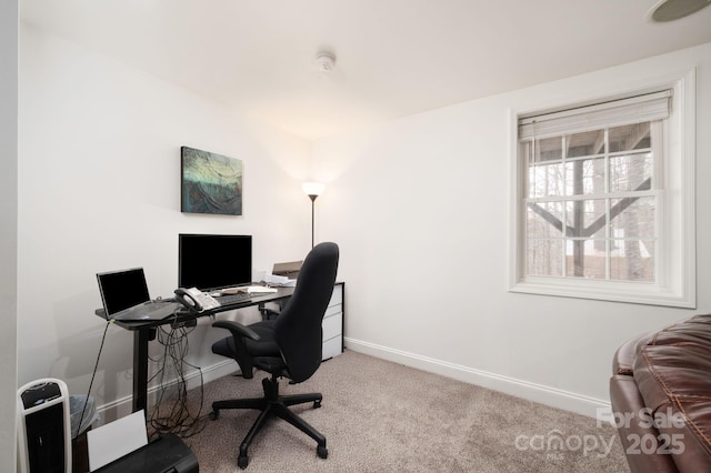 home office featuring baseboards and carpet floors