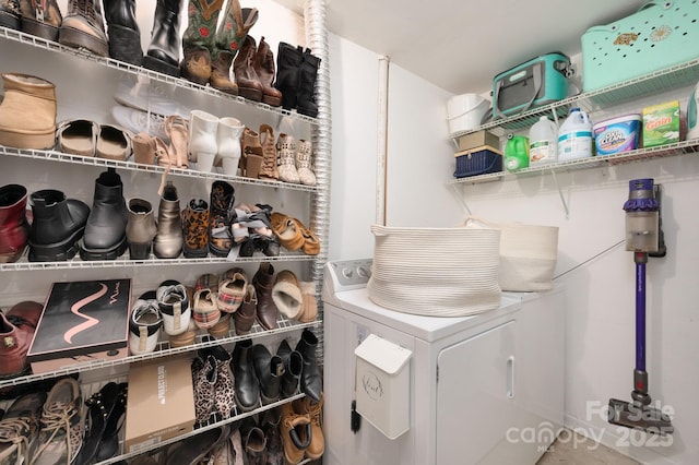 bathroom featuring washer and dryer