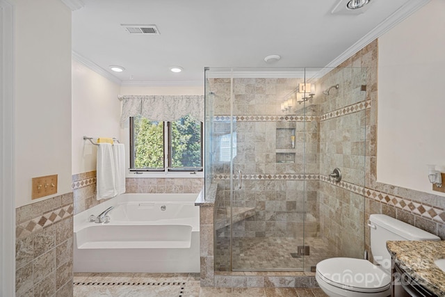 full bathroom featuring a garden tub, toilet, tile walls, and crown molding