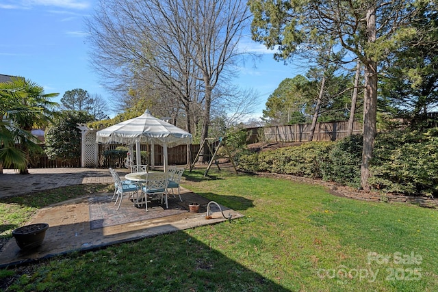 view of yard with a patio and a fenced backyard