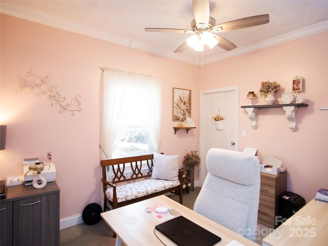 office featuring baseboards, a ceiling fan, and crown molding