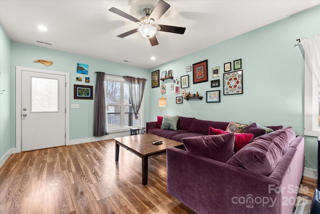 living room with visible vents, wood finished floors, recessed lighting, baseboards, and ceiling fan