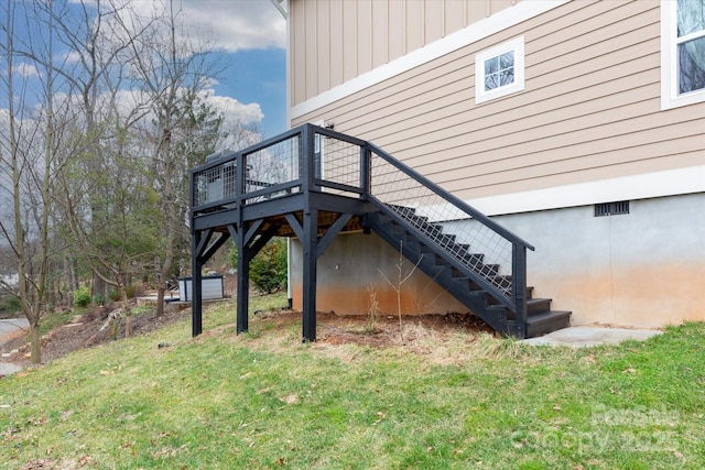 exterior space with a deck and stairway