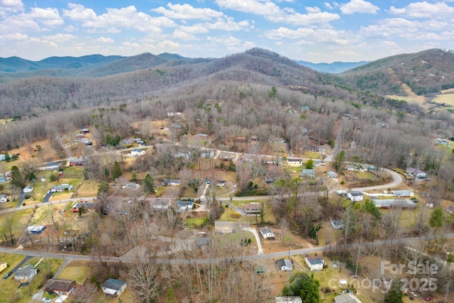 drone / aerial view featuring a mountain view