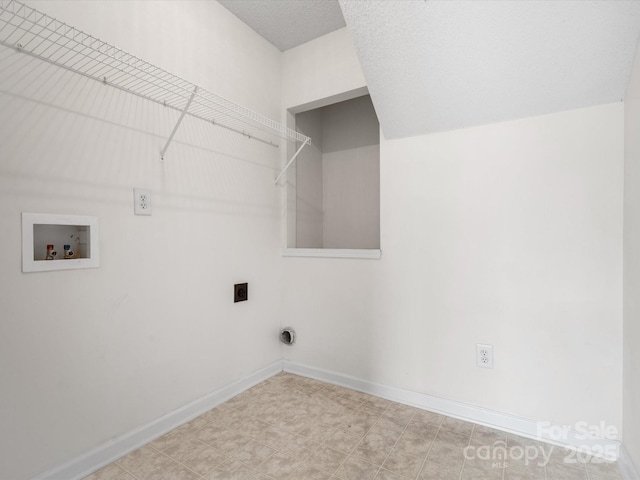 laundry room featuring laundry area, hookup for a washing machine, hookup for an electric dryer, and baseboards