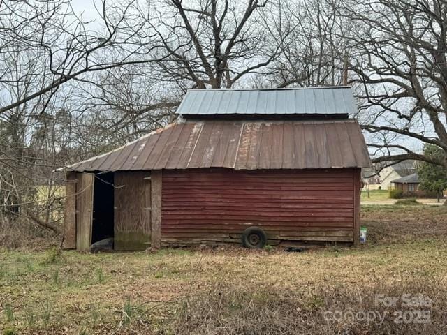 view of outbuilding featuring an outdoor structure