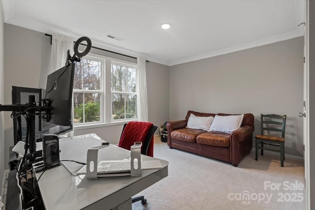 office with crown molding, carpet flooring, and visible vents