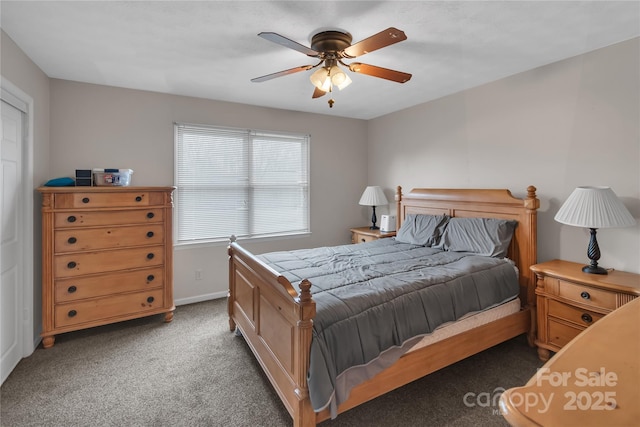 bedroom with baseboards, carpet floors, and a ceiling fan