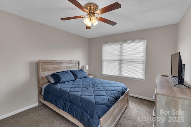 bedroom with carpet flooring, baseboards, and ceiling fan