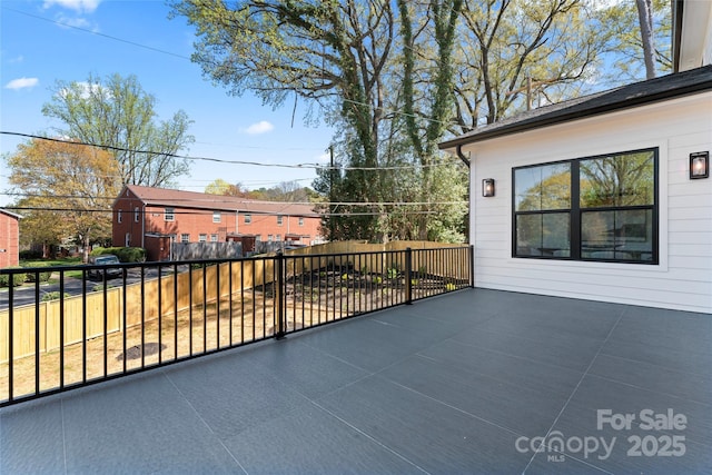 view of patio with fence
