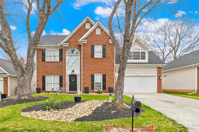 view of front of home featuring concrete driveway, an attached garage, brick siding, and a front lawn