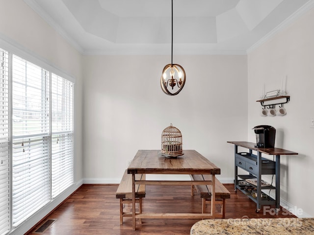 interior space featuring visible vents, a raised ceiling, a notable chandelier, and dark wood finished floors