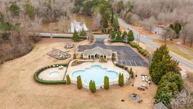 community pool featuring a patio area