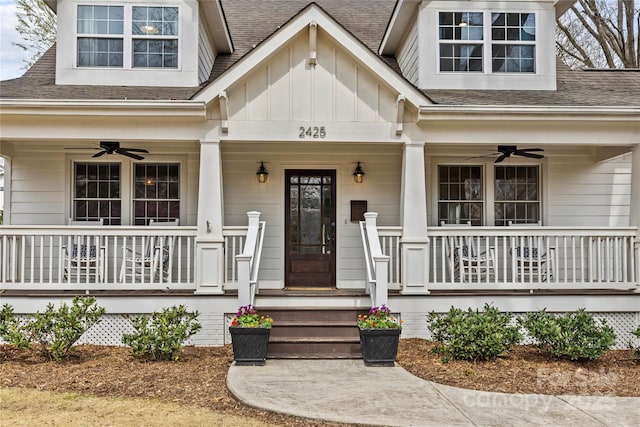 property entrance featuring covered porch, board and batten siding, a shingled roof, and a ceiling fan