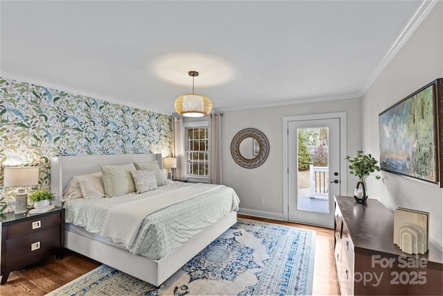 bedroom featuring wallpapered walls, crown molding, access to exterior, and dark wood-style flooring