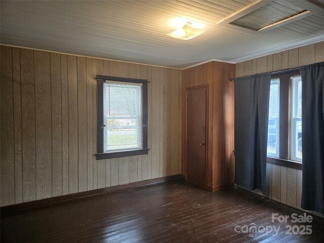 empty room featuring dark wood-style flooring