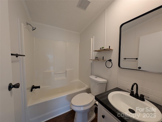 full bathroom with visible vents, toilet, decorative backsplash, bathing tub / shower combination, and a textured ceiling