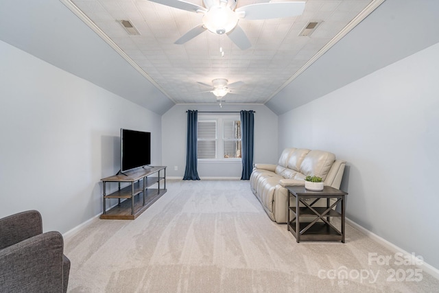 living area featuring visible vents, carpet floors, baseboards, and vaulted ceiling