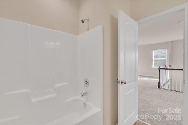 full bathroom with shower / washtub combination