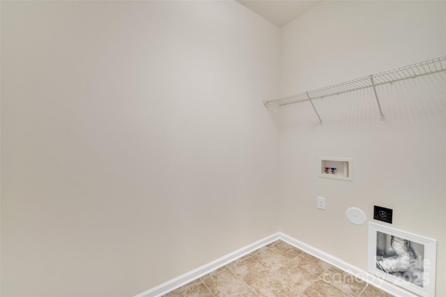 laundry room with laundry area, hookup for a washing machine, electric dryer hookup, and baseboards