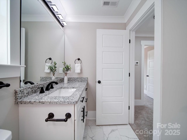 bathroom featuring visible vents, marble finish floor, vanity, and baseboards