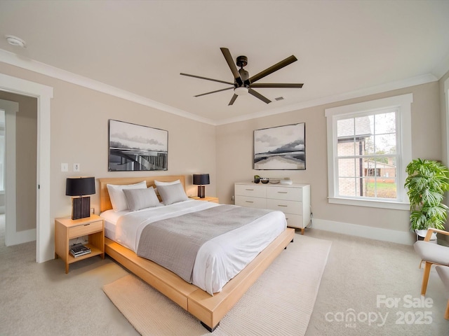 bedroom with a ceiling fan, baseboards, light colored carpet, and crown molding