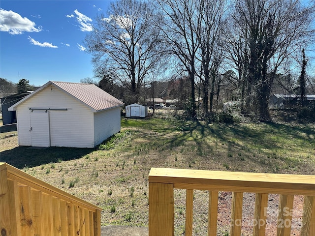 view of yard with a storage unit and an outdoor structure