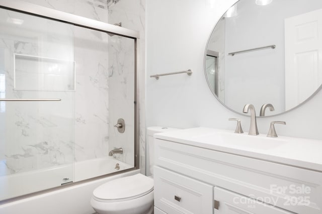 full bath with toilet, vanity, and enclosed tub / shower combo
