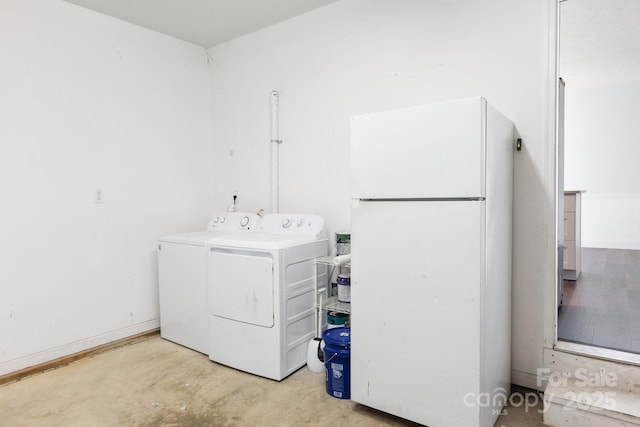 laundry room featuring independent washer and dryer and laundry area
