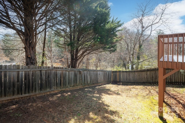 view of yard featuring a fenced backyard
