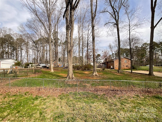 view of yard with fence