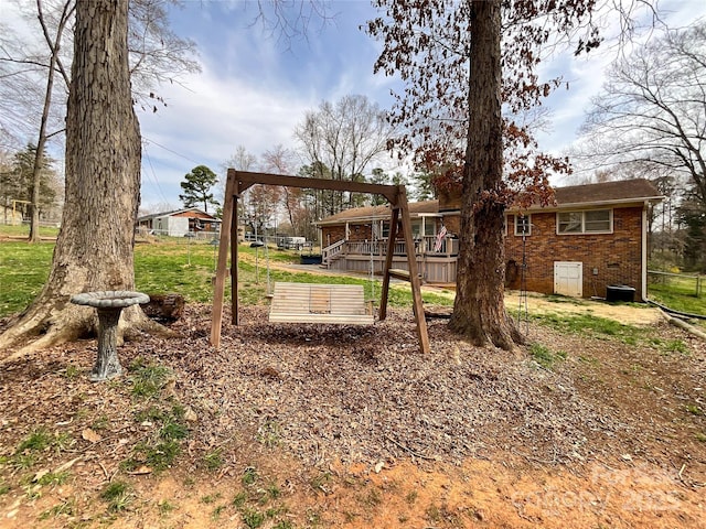 view of yard with a wooden deck