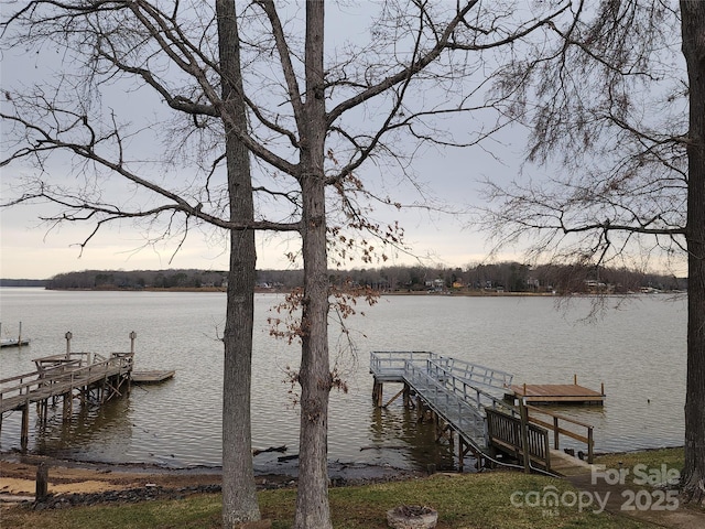 dock area featuring a water view