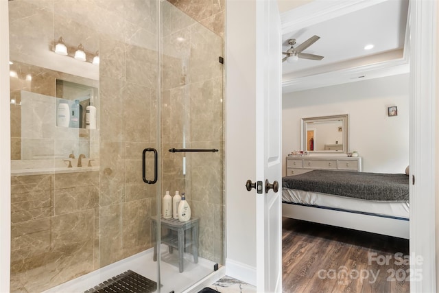 bathroom featuring recessed lighting, wood finished floors, a stall shower, and ceiling fan