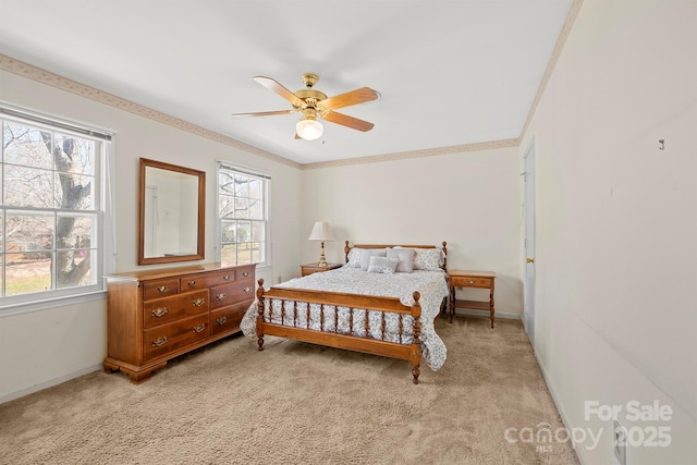 bedroom with multiple windows, carpet floors, and baseboards