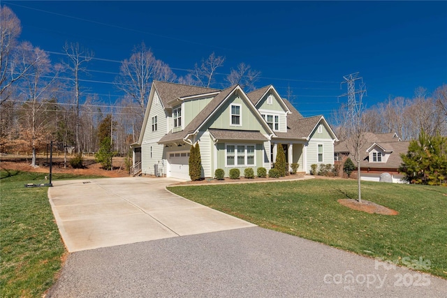 view of front facade with a front lawn, board and batten siding, concrete driveway, a shingled roof, and a garage